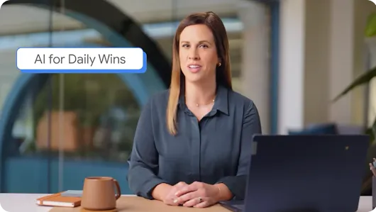 A video thumbnail or screenshot featuring a female instructor presenting a course. She is seated at a modern office desk with a laptop, a brown coffee mug, and a notebook in front of her. In the top-left corner, a prominent blue-shadowed text bubble reads "AI for Daily Wins."