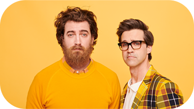 Half body image of Rhett & Link
